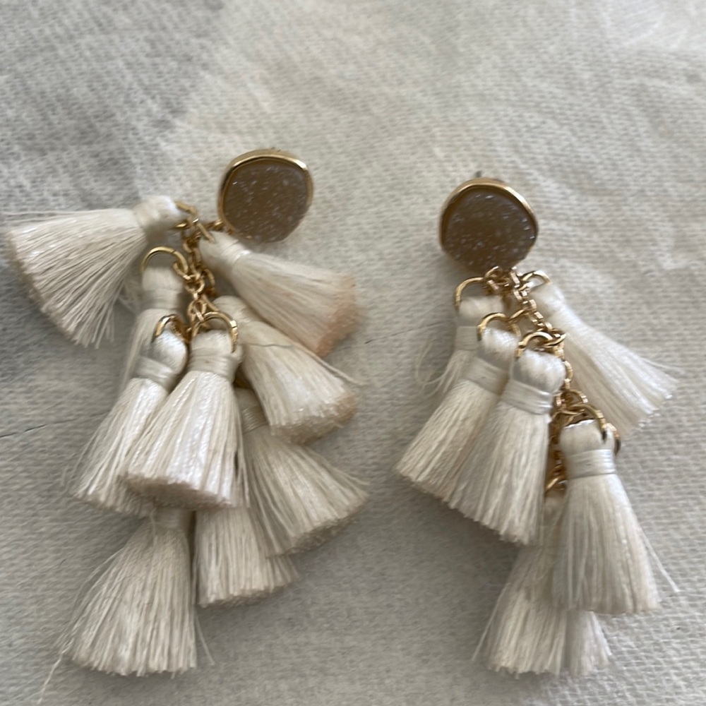 Earing. Color white & gold